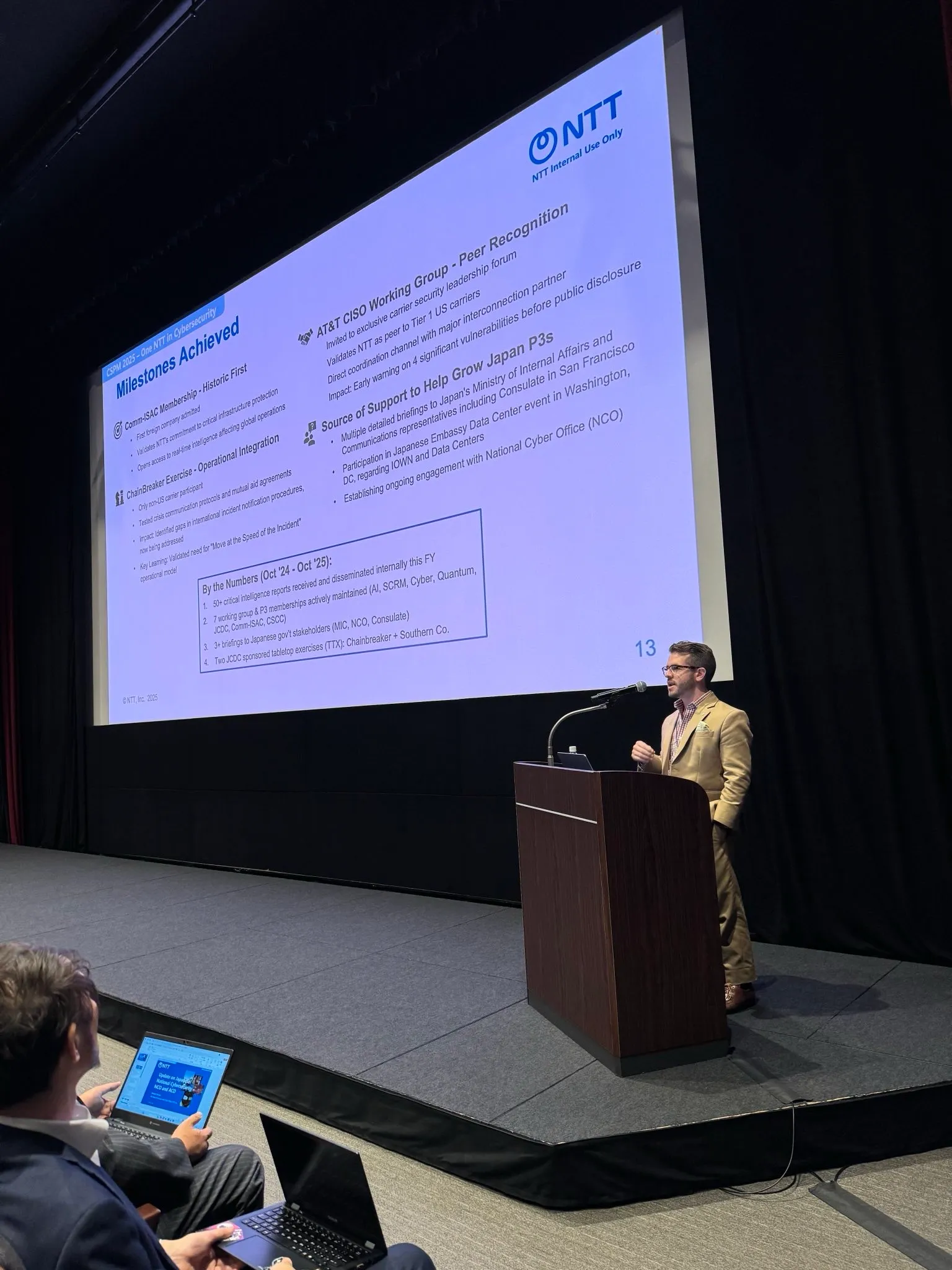 Brandon Karpf delivering a keynote on cybersecurity and national security strategy